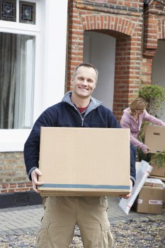 A man with van service in West Kensington helping with a local move