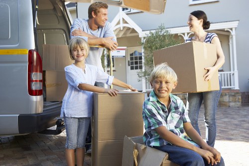 Loading furniture into a van in West Kensington