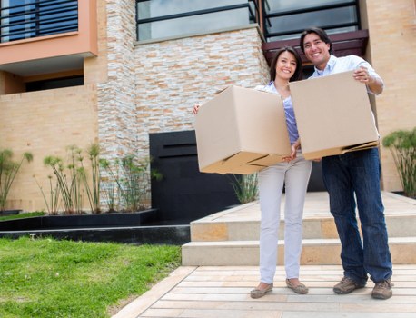 Professional movers loading furniture in Westkensington