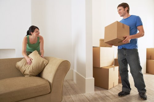 Local furniture removal team loading items in Westkensington